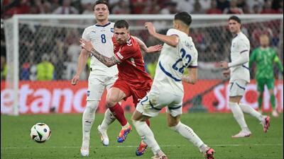 Denmark's Pierre-Emile Hojbjerg (C) tries to get past Serbian defenders during their Euro 2024 match on Tuesday. (AFP) Denmark's Pierre-Emile Hojbjerg (C) tries to get past Serbian defenders during their Euro 2024 match on Tuesday. (AFP)