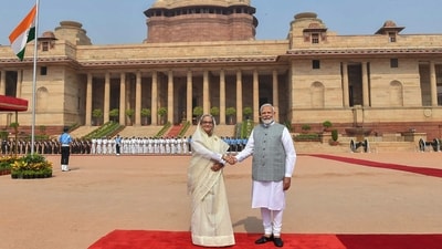 This handout photograph taken and released on June 22, 2024 by the Indian Press Information Bureau (PIB) shows India's Prime Minister Narendra Modi shaking hands with Bangladesh's counterpart Sheikh Hasina (L) after receiving her at the Presidential Palace Rashtrapati Bhavan in New Delhi on June 22, 2024. (Photo by PIB / AFP) / RESTRICTED TO EDITORIAL USE - MANDATORY CREDIT "AFP PHOTO /Indian Press Information Bureau (PIB) " - NO MARKETING NO ADVERTISING CAMPAIGNS - DISTRIBUTED AS A SERVICE TO CLIENTS (AFP) This handout photograph taken and released on June 22, 2024 by the Indian Press Information Bureau (PIB) shows India's Prime Minister Narendra Modi shaking hands with Bangladesh's counterpart Sheikh Hasina (L) after receiving her at the Presidential Palace Rashtrapati Bhavan in New Delhi on June 22, 2024. (Photo by PIB / AFP) / RESTRICTED TO EDITORIAL USE - MANDATORY CREDIT "AFP PHOTO /Indian Press Information Bureau (PIB) " - NO MARKETING NO ADVERTISING CAMPAIGNS - DISTRIBUTED AS A SERVICE TO CLIENTS (AFP)