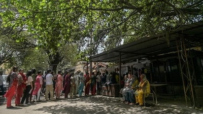 Women stand in a queue at a polling station to cast their ballot during the first phase of voting of India's general elections in Jammu, some 230 Kms from Srinagar on April 19, 2024. (Photo by TAUSEEF MUSTAFA / AFP) (AFP) Women stand in a queue at a polling station to cast their ballot during the first phase of voting of India's general elections in Jammu, some 230 Kms from Srinagar on April 19, 2024. (Photo by TAUSEEF MUSTAFA / AFP) (AFP)