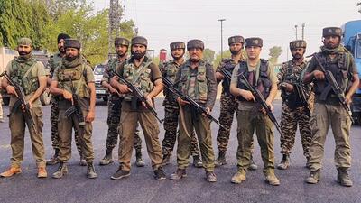 Jammu Kashmir Police and CRPF personnel stand guard outside Amarnath Yatra base camp. (ANI) Jammu Kashmir Police and CRPF personnel stand guard outside Amarnath Yatra base camp. (ANI)