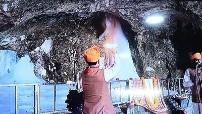 'Pratham Puja' being performed at the Amarnath cave to mark the ceremonial commencement of the Annual Amarnath Yatra (PTI)