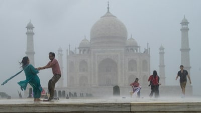 Agra: Tourists enjoy during rains, at the Taj Mahal, in Agra, Wednesday, June 26, 2024. (PTI Photo) (PTI) Agra: Tourists enjoy during rains, at the Taj Mahal, in Agra, Wednesday, June 26, 2024. (PTI Photo) (PTI)