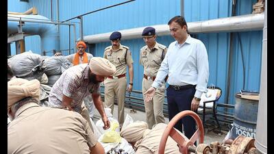 Police officers getting destroyed the seized drugs in Bathinda on Wednesday. (HT photo) Police officers getting destroyed the seized drugs in Bathinda on Wednesday. (HT photo)