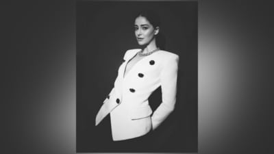 Ananya wore the jacket with black cycling shorts featuring a bodycon fitting, a high-rise waist, and an above-the-knee hem length. She accessorised the ensemble with black pumps and statement jewellery pieces, including a twisted chain-link choker and rings. (Instagram) Ananya wore the jacket with black cycling shorts featuring a bodycon fitting, a high-rise waist, and an above-the-knee hem length. She accessorised the ensemble with black pumps and statement jewellery pieces, including a twisted chain-link choker and rings. (Instagram)
