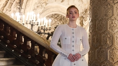 Sadie Sink poses upon arrival ahead of the Chanel's Haute-Couture Fall/Winter 2024 show as part of the Paris Fashion Week at Palais Garnier (Opera national de Paris) opera house in Paris. She wore a white dress with a balloon bottom. Sadie Sink poses upon arrival ahead of the Chanel's Haute-Couture Fall/Winter 2024 show as part of the Paris Fashion Week at Palais Garnier (Opera national de Paris) opera house in Paris. She wore a white dress with a balloon bottom. 
