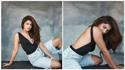 Wamiqa Gabbi raised temperature in this stunning and sizzling bodysuit with bare back and a plunging neckline. She teamed it with a ripped light wash denim jeans. Wamiqa Gabbi raised temperature in this stunning and sizzling bodysuit with bare back and a plunging neckline. She teamed it with a ripped light wash denim jeans. 