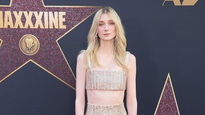 It's Lady Di! Elizabeth Debicki attended Maxxxine premiere in a golden crop top and skirt. It's Lady Di! Elizabeth Debicki attended Maxxxine premiere in a golden crop top and skirt.