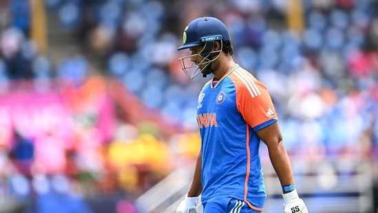India's Shivam Dube walks back to the pavilion after his dismissal (AFP)