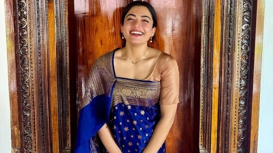 Rashmika Mandanna wore her saree in traditional style while attending the wedding.