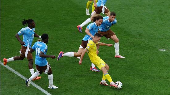 Ukraine's Heorhiy Sudakov shoots at goal in a Euro 2024 Group E match against Belgium in Stuttgart on Wednesday. (REUTERS)
