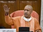 Chief minister Yogi Adityanath slammed the Samajwadi Party for calling Sengol 'Raja ka danda' (HT FILE)