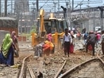 Labourers work for the extension of platforms 10 and 11 to accommodate 24-coach trains, at CSMT, during the 36-hour Mega Block by Central Railway on Saturday. (Bhushan Koyande/HT) Labourers work for the extension of platforms 10 and 11 to accommodate 24-coach trains, at CSMT, during the 36-hour Mega Block by Central Railway on Saturday. (Bhushan Koyande/HT)