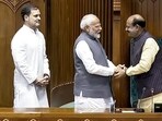 Prime Minister Narendra Modi and Leader of the Opposition Rahul Gandhi with newly elected Lok Sabha speaker Om Birla, at Parliament House in New Delhi on Wednesday. Prime Minister Narendra Modi and Leader of the Opposition Rahul Gandhi with newly elected Lok Sabha speaker Om Birla, at Parliament House in New Delhi on Wednesday.