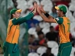 South Africa's Tristan Stubbs, left, celebrates with teammate Marco Jansen after taking a catch to dismiss Afghanistan's Azmatullah Omarzai South Africa's Tristan Stubbs, left, celebrates with teammate Marco Jansen after taking a catch to dismiss Afghanistan's Azmatullah Omarzai