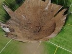 Terrifying sinkhole incident at Gordon Moore Park in Alton, Illinois captured on tape, leading to closure of affected area for safety checks Terrifying sinkhole incident at Gordon Moore Park in Alton, Illinois captured on tape, leading to closure of affected area for safety checks