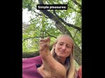Snapshot of the woman picking strawberry from her feet. Snapshot of the woman picking strawberry from her feet.