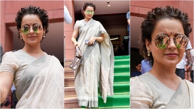 Kangana Ranaut's grey saree exemplifies minimalist fashion. Showcasing a perfect blend of class and style, she draped her saree traditionally, letting the pallu cascade beautifully from her shoulders. Paired with a matching round-neck blouse, sunglasses, and a small black bindi on her forehead, she completed her look perfectly. (HT photo) Kangana Ranaut's grey saree exemplifies minimalist fashion. Showcasing a perfect blend of class and style, she draped her saree traditionally, letting the pallu cascade beautifully from her shoulders. Paired with a matching round-neck blouse, sunglasses, and a small black bindi on her forehead, she completed her look perfectly. (HT photo)