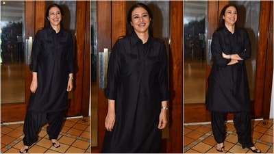 A black salwar suit never goes out of style, and Tabu is here to demonstrate how to wear it with utmost flair. Her outfit showcases a black loose-fit kurta with a collared neckline and folded sleeves, paired elegantly with matching salwar for a perfect monochrome look. Styled with a wristwatch, stylish heels, glamorous makeup and loose tresses, she exudes fashion finesse effortlessly. (HT photo/VarinderChawla) A black salwar suit never goes out of style, and Tabu is here to demonstrate how to wear it with utmost flair. Her outfit showcases a black loose-fit kurta with a collared neckline and folded sleeves, paired elegantly with matching salwar for a perfect monochrome look. Styled with a wristwatch, stylish heels, glamorous makeup and loose tresses, she exudes fashion finesse effortlessly. (HT photo/VarinderChawla)