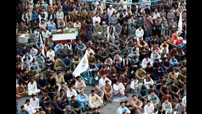 Afghan cricket fans watch the men's T20 World Cup semifinal cricket match between Afghanistan and South Africa, on a big screen in the city of Jalalabad, east of Afghanistan, Thursday, June 27, 2024. AP/PTI(AP06_27_2024_000044A) (AP)