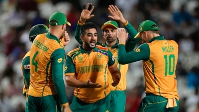 South Africa's Tabraiz Shamsi, centre, is congratulated by teammates after dismissing Afghanistan's Noor Ahmad (PTI) South Africa's Tabraiz Shamsi, centre, is congratulated by teammates after dismissing Afghanistan's Noor Ahmad (PTI)
