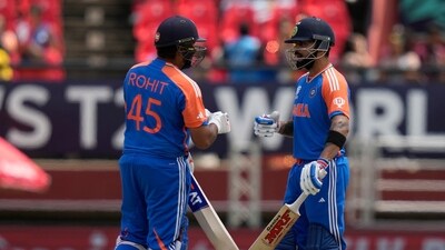 India's captain Rohit Sharma, left, and Virat Kohli celebrate scoring runs during the ICC Men's T20 World Cup second semifinal cricket match between England and India at the Guyana National Stadium in Providence, Guyana (PTI) India's captain Rohit Sharma, left, and Virat Kohli celebrate scoring runs during the ICC Men's T20 World Cup second semifinal cricket match between England and India at the Guyana National Stadium in Providence, Guyana (PTI)