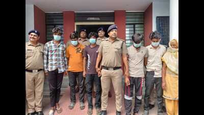 Police with the accused arrested in connection with the gang rape and murder of a girl, in Haridwar on Thursday. (HT) Police with the accused arrested in connection with the gang rape and murder of a girl, in Haridwar on Thursday. (HT)