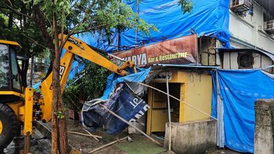 The Mira-Bhayander Municipal Corporation on Thursday demolished two unauthorised bars, 'Timeless' and 'Aishwarya', in Mira Road. (Azim Tamboli) The Mira-Bhayander Municipal Corporation on Thursday demolished two unauthorised bars, 'Timeless' and 'Aishwarya', in Mira Road. (Azim Tamboli)