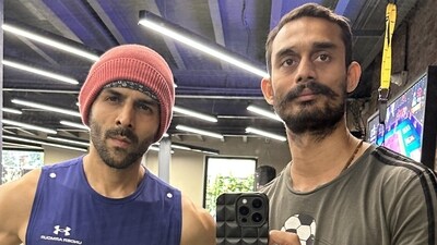Actor Kartik Aaryan and trainer Tridev Pandey (right) Actor Kartik Aaryan and trainer Tridev Pandey (right)