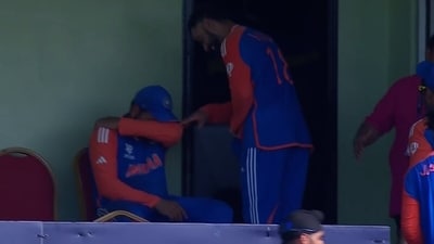 Virat Kohli tries to cheer up Rohit Sharma after the India skipper was overwhelmed with emotions. (Screengrab) Virat Kohli tries to cheer up Rohit Sharma after the India skipper was overwhelmed with emotions. (Screengrab)