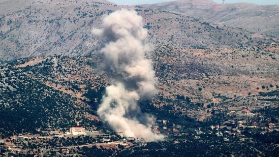 A smoke plume billows during Israeli bombardment on the village of Kfarshuba in south Lebanon near the border with Israel on June 26, 2024 amid ongoing cross-border tensions as fighting continues between Israel and Hamas in the Gaza Strip. (AFP)