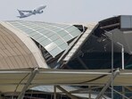 New Delhi: A plane takes off from the Indira Gandhi International Airport where a canopy collapsed on vehicles parked at Terminal- 1 amid heavy rain, in New Delhi, Friday, June 28, 2024. One person died and five were injured in the collapse. (PTI Photo/Kamal Singh) (PTI06_28_2024_000297A) *** Local Caption ***  