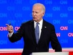 President Joe Biden mocks Donald Trump's drug claims with 'Dark Brandon' meme (AP Photo/Gerald Herbert)