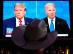 Roger Strassburg, of Scottsdale, Ariz., wears a cowboy hat as he watches the presidential debate between President Joe Biden and Republican presidential candidate former President Donald Trump at a debate watch party Thursday, June 27, 2024, in Scottsdale, Ariz. (AP Photo/Ross D. Franklin)