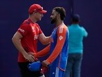 India's Virat Kohli, right, shake hands with England's captain Jos Buttler at the end of the ICC Men's T20 World Cup second semifinal