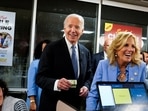 U.S. President Joe Biden and First Lady Jill Biden laugh as they pick up an order from a Waffle House in Marietta, Georgia, after participating in a presidential debate in Atlanta, Georgia, U.S., June 28, 2024. REUTERS/Elizabeth Frantz