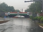Delhi rain: A vehicle partially submerged in the waterlogged underpass at Minto bridge.