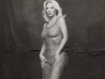 This look feautred a chain-mail dress with a bodysuit underneath. She wore her hair in a blonde long bob. &nbsp;