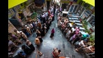People queue up to cast their vote in New Delhi on May 25, 2024. (Altaf Qadri/AP Photo)