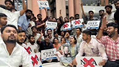 Members of NSUI stage a protest demonstration outside the National Testing Agency (NTA) office calling for a ban on the agency in New Delhi on Thursday. (ANI Photo) Members of NSUI stage a protest demonstration outside the National Testing Agency (NTA) office calling for a ban on the agency in New Delhi on Thursday. (ANI Photo)