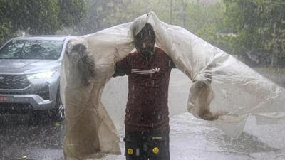 According to the weather department, the city received 30mm rainfall. (PTI photo) According to the weather department, the city received 30mm rainfall. (PTI photo)