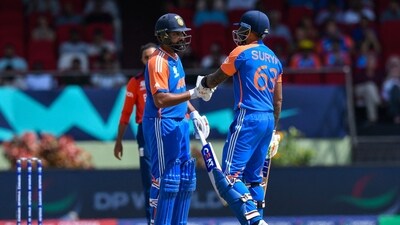 Rohit Sharma (L) and Suryakumar Yadav added 73 runs for the fourth wicket (AFP) Rohit Sharma (L) and Suryakumar Yadav added 73 runs for the fourth wicket (AFP)