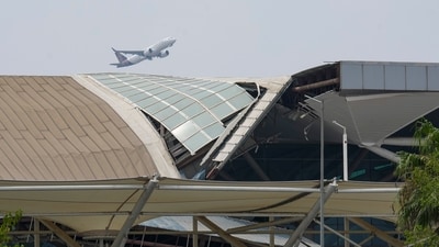 New Delhi: A plane takes off from the Indira Gandhi International Airport where a canopy collapsed on vehicles parked at Terminal- 1 amid heavy rain, in New Delhi, Friday, June 28, 2024. One person died and five were injured in the collapse. (PTI Photo/Kamal Singh) (PTI06_28_2024_000297A) *** Local Caption *** (PTI)