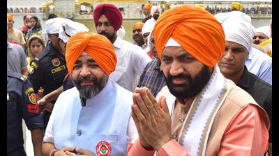 Haryana chief minister Nayab Singh Saini with others at the Golden Temple in Amritsar on Friday. Haryana chief minister Nayab Singh Saini with others at the Golden Temple in Amritsar on Friday.