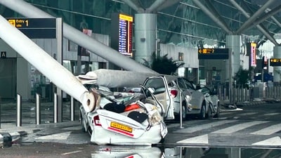 Parked vehicles are damaged by the collapse of a departure terminal canopy at New Delhi's Indira Gandhi International Airport (AP) Parked vehicles are damaged by the collapse of a departure terminal canopy at New Delhi's Indira Gandhi International Airport (AP)