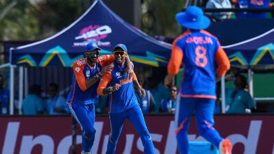 India's Axar Patel (L) and Suryakumar Yadav celebrate the dismissal of England's Adil Rashid during the semi-final on Thursday. (AFP) India's Axar Patel (L) and Suryakumar Yadav celebrate the dismissal of England's Adil Rashid during the semi-final on Thursday. (AFP)