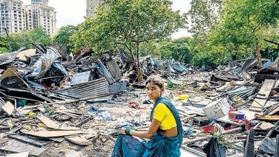 Nearly 100 families whose homes were razed on June 6 are still camping near the site, without access to food, water and shelter. (Photo by Satish Bate/ Hindustan Times) (Hindustan Times) Nearly 100 families whose homes were razed on June 6 are still camping near the site, without access to food, water and shelter. (Photo by Satish Bate/ Hindustan Times) (Hindustan Times)