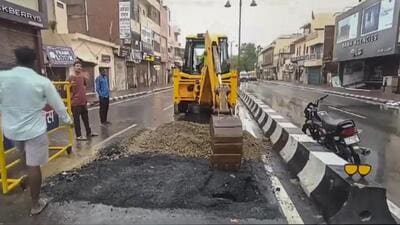 Repair work underway after a road got damaged due to rain, in Ayodhya, on Wednesday. (PTI FILE PHOTO) Repair work underway after a road got damaged due to rain, in Ayodhya, on Wednesday. (PTI FILE PHOTO)