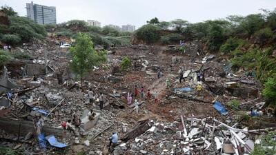 Residents of their destroyed homes after a demolition drive was carried out by the Municipal Corporation of Faridabad on its land in Khori village in the Aravalli region, in Faridabad in 2021. (HT Photo)