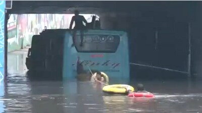 A video shared by news agency ANI showed the passengers being rescued from the bus on Friday. (ANI) A video shared by news agency ANI showed the passengers being rescued from the bus on Friday. (ANI)