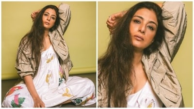 Tabu turns head in a white dress with a pop of knitted colours, and finished the look with a chic brown jacket. Tabu turns head in a white dress with a pop of knitted colours, and finished the look with a chic brown jacket. 